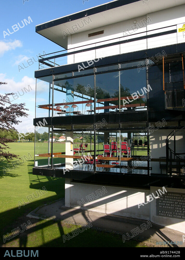 SIMON INGLIS. Geoffrey Hughes Memorial Ground, Sports Pavilion, Mather Avenue, Wyncote, Liverpool, 2005. A corner of the glazed clubhouse of the 1960s sports pavilion at the Geoffrey Hughes Memorial Ground. The sports pavilion complex was designed by Gerald Beech, in association with Geoffrey Holland. It was built in 1962 and cost £101,000. The complex, which includes changing room block, clubhouse and promenade, is Listed Grade II and won a Class One Award from the Civic Trust in 1963.