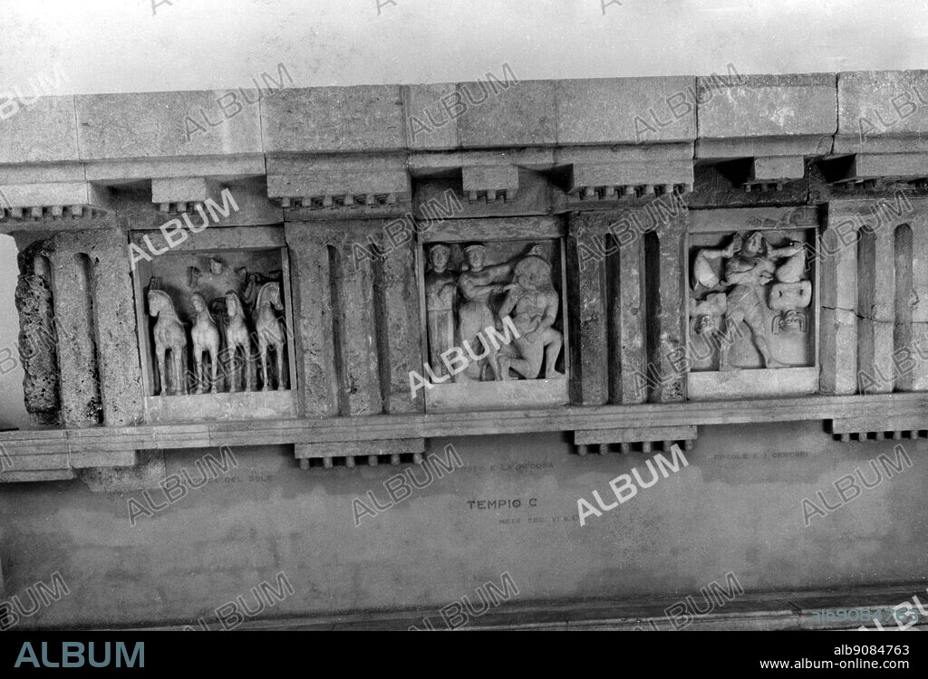Three metopes from temple C, Selinus, now in the Museo Archeologico Nazionale, Palermo, The centre metope shows Perseus cutting off the head of Medusa. © TopFoto.