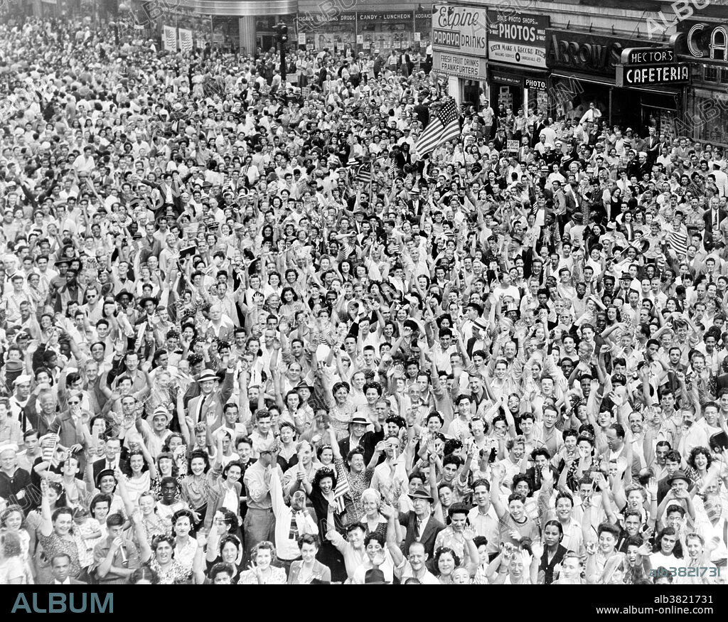 On August 15, 1945, the largest crowd in the history of Times Square gathered to celebrate Victory over Japan Day. The victory itself was announced by a headline on the zipper news ticker at One Times Square, which read "*** OFFICIAL TRUMAN ANNOUNCES JAPANESE SURRENDER ***"; the six asterisks representing the branches of the U.S. Armed Forces. Times Square is a major commercial intersection and neighborhood in Midtown Manhattan, at the junction of Broadway and Seventh Avenue. Brightly adorned with billboards and advertisements. Times Square is sometimes referred to as The Crossroads of the World, The Center of the Universe, and the heart of The Great White Way. One of the world's busiest pedestrian intersections and the hub of the Broadway Theater District. Photographed by Dick DeMarsico, August 15, 1945.