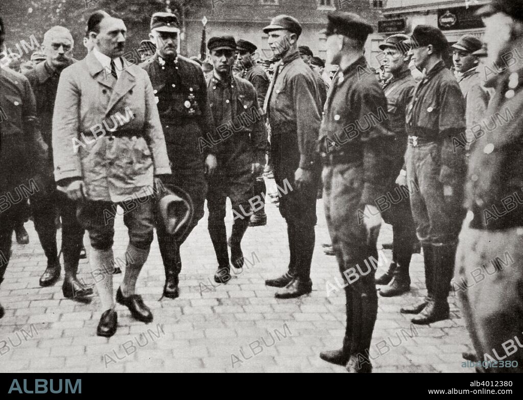 Hitler inspecting a group of SA Members during World War II, Germany, 1939-1945. Founded in c1919, the Sturmabteilung (SA) was the paramilitary wing of the Nazi party. Its members were known as the 'Brownshirts' because of the colour of their uniforms. The SA played an important part in Hitler's (1889-1945) rise to power in Germany but its significance was effectively ended when its leaders were killed in the 'Night of the Long Knives' in 1934, with the rival Schutzstaffel (SS) taking over its role.