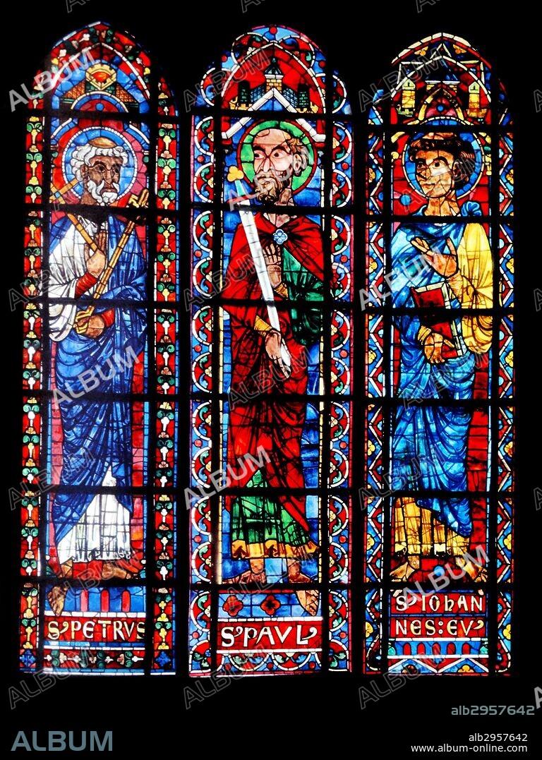 Stained glass windows from Bourges Cathedral, France. Shows the Apostles; Peter, Paul and John; 13th century.