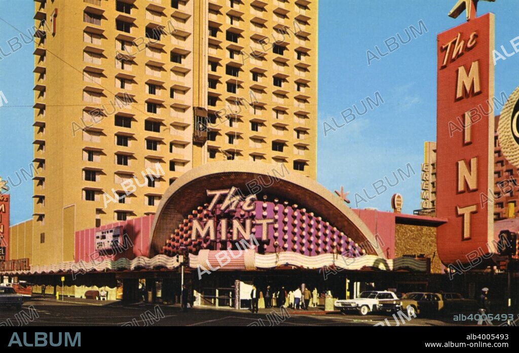 The Mint Casino and Hotel, Las Vegas, Nevada, USA, 1966. Vintage postcard showing the exterior of the Mint with its pink arched built-in sign and 26 storey tower. The famous Mint stand-alone sign is also visible. The Mint opened in 1957, but was sold in 1988, becoming part of Binion's Horseshoe.