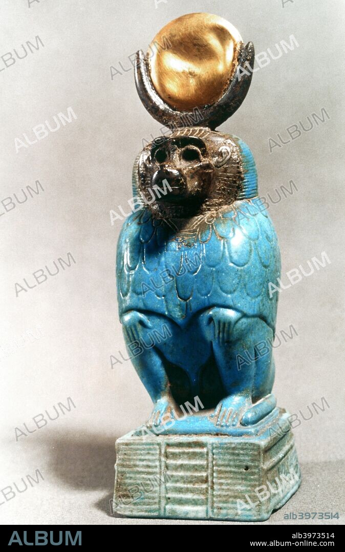 Statue of the Ancient Egyptian god Thoth in baboon form. Thoth was usually portrayed with the head of an ibis, but in Ancient Egyptian mytholigy he also took the form of a baboon in his manifestation as A'an, the god of equilibrium who reported when the scales weighing the heart of the deceased against the feather were exactly in balance. Located in the Louvre, Paris.