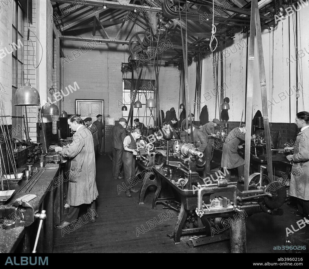 The Birmingham Small Arms factory, Small Heath, Birmingham, February 1917. Men and boys working in the tool room during the First World War. One of series of photographs of the BSA factory which produced rifles, Lewis guns, shells and military vehicles.Birmingham Small Arms factory:.