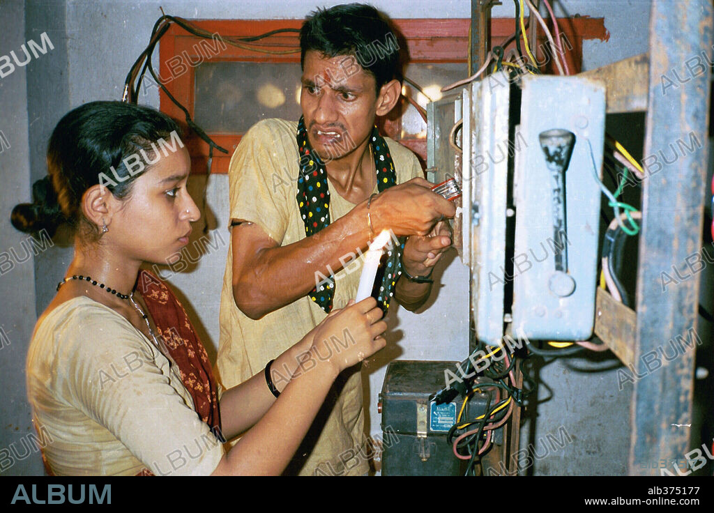 TILOTAMA SHOME and VIJAY RAAZ in MONSOON WEDDING, 2001, directed by MIRA NAIR. Copyright MIRABAI FILMS.
