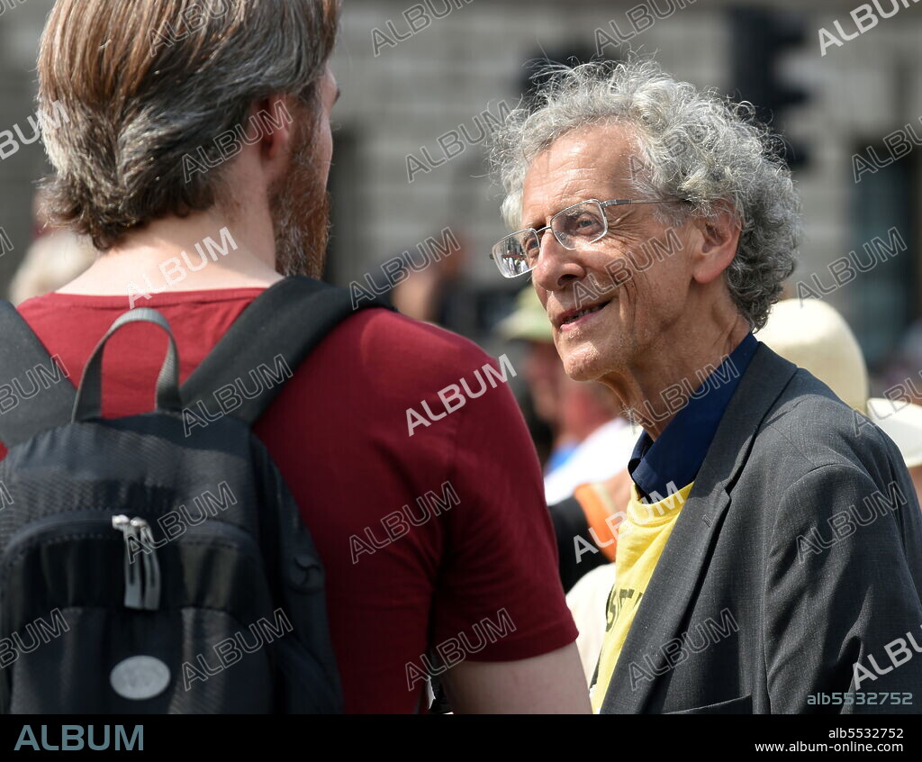 Piers Corbyn activist, anti-vaxxer and conspiracy theorist joins anti-Lockdown protesters gathered in Westminster as London opened up with all restrictions including the wearing of masks being dropped on so-called Freedom Day at the end of a third national lockdown in England amid the COVID-19 coronavirus pandemic..