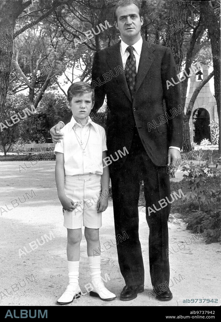 May 29, 1975. The infant Don Felipe with his father the prince Don Juan Carlos after receiving the first Communion.