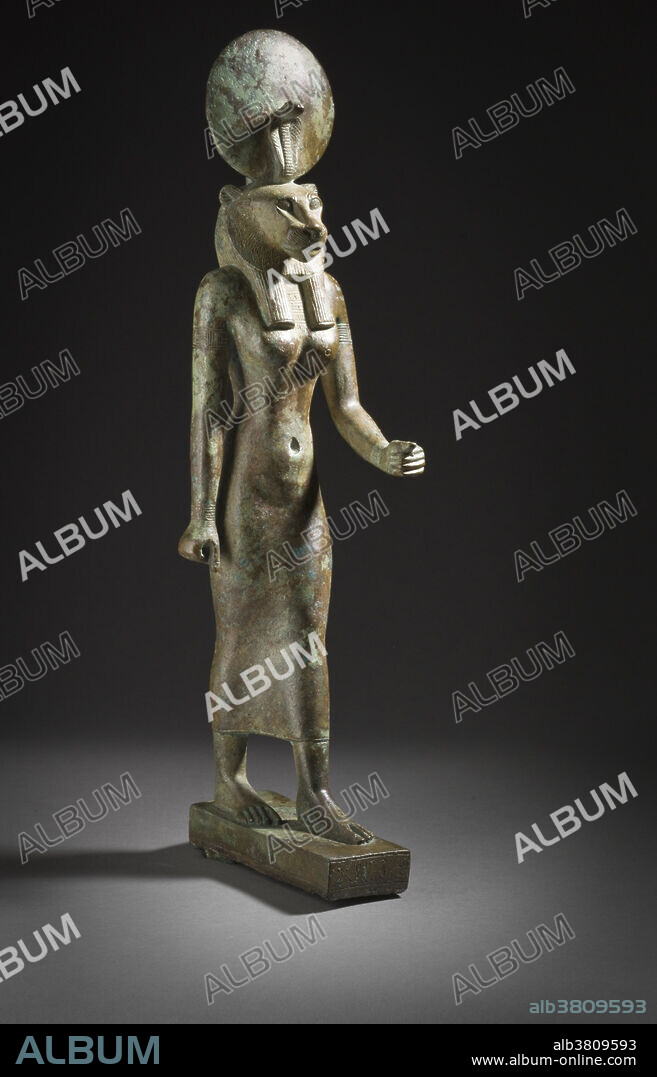 Bronze figurine of the Egyptian Goddess Wadjet, Egypt, 26th Dynasty (664 - 525 BC). Wadjet, known to the Greek world as Uto or Buto, was originally the ancient local goddess of the city of Dep (Buto), a city that was an important site in the Predynastic era of Ancient Egypt and the cultural developments of the Paleolithic. She was said to be the patron and protector of Lower Egypt and upon unification with Upper Egypt, the joint protector and patron of all of Egypt with the goddess of Upper Egypt. The image of Wadjet with the sun disk is called the Uraeus, and it was the emblem on the crown of the rulers of Lower Egypt. She was also the protector of kings and of women in childbirth. As the patron goddess, she was associated with the land and depicted as a snake-headed woman or a snake, usually an Egyptian cobra. Sometimes she was depicted as a woman with two snake heads and, at other times, a snake with a woman's head.