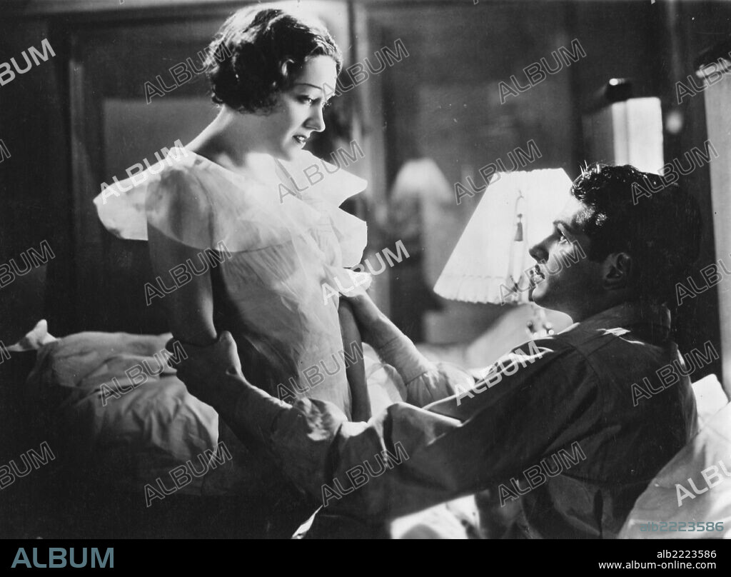 GLORIA SWANSON and LAURENCE OLIVIER in A PERFECT UNDERSTANDING, 1933. Copyright UNITED ARTISTS BRITISH.