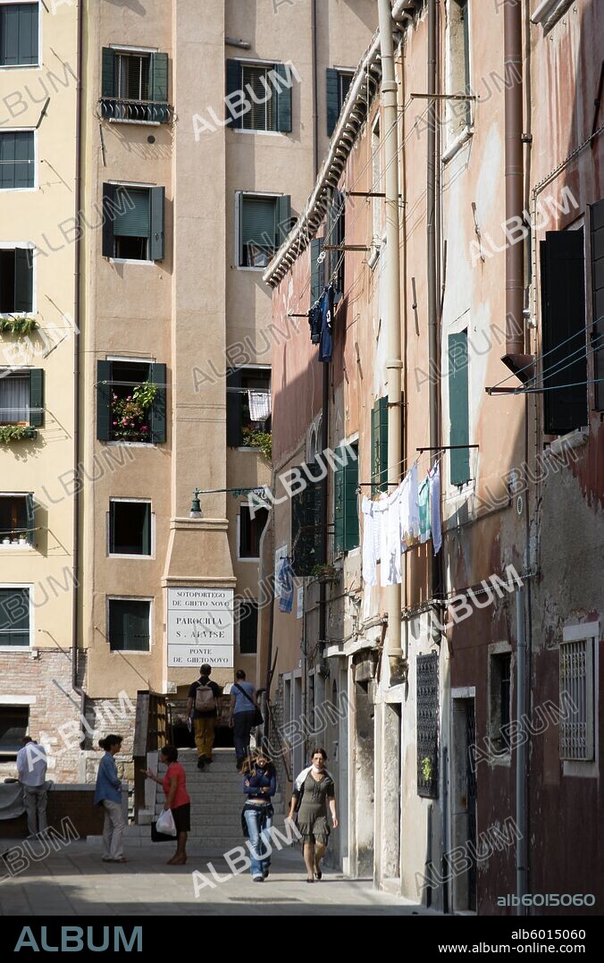 ITALY Veneto Venice One of the three entrances to the Jewish Ghetto in Cannaregio district. A small bridge the Ponte de Gheto Novo at the end of a narrow street leads across a canal into the Ghetto.
