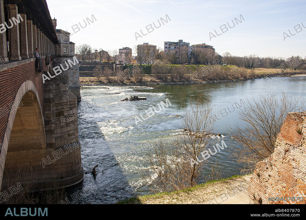 Pavia, Lombardy, Italy, Europe. Ticino River (Tessin, Ticinus). The river rises in the Val Bedretto in Switzerland at the frontier between the cantons of Valais and Ticino, is fed by the glaciers of the Alps and later flows through Lake Maggiore, before entering Italy. The Ticino joins the Po a few kilometres from Pavia.