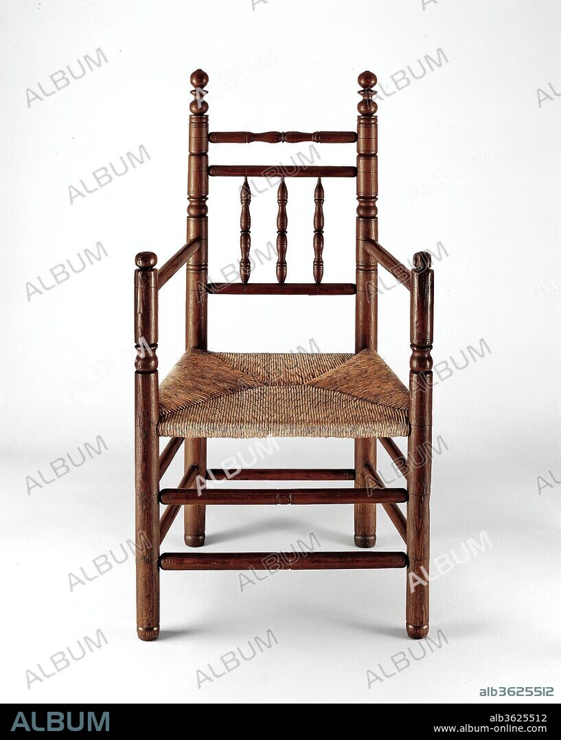Spindle-back armchair. Culture: American. Dimensions: 46 1/4 x 24 7/8 x 17 5/8 in. (117.5 x 63.2 x 44.8 cm). Date: 1660-1700.
The finials on this chair fall within a broad category that features a prominent spherical form at the top above one or two reels, a ring, or ball in many configurations. Such finials are found on seventeenth-century turned chairs from southern New England, in southeastern Massachusetts (10.125.236) and the Connecticut shore (10.125.208) that appear to date toward the end of the 1600s, and in the eighteenth century they become ubiquitous.