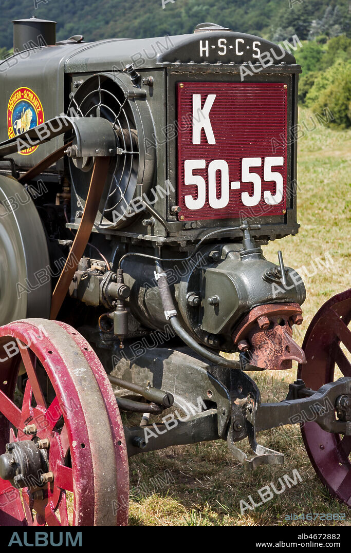 Old Tractor. Detail.. Make: HSCS (Hofherr - Schrantz - Clayton - Shuttleworth). Model: K44-48. Year: 1938 - 1942. Fuel: crude oil and/or diesel oil. Number of Cylinders: . Displacement: about 10.600 cc. Horse Power: 44 HP at the wheel and 48 HP at the PTO (Power Take-Off). Characteristics: 2-stroke diesel cycle. It had been used in the Second World War to pull the cannons, but then it was abandoned because it made too much noise and signaled the vehicle to the enemies.
