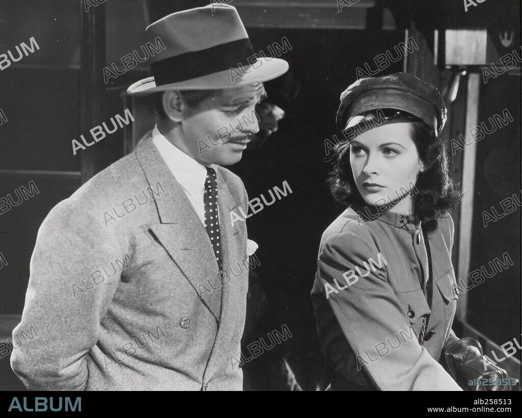 CLARK GABLE and HEDY LAMARR in COMRADE X, 1940, directed by KING VIDOR. Copyright M.G.M.