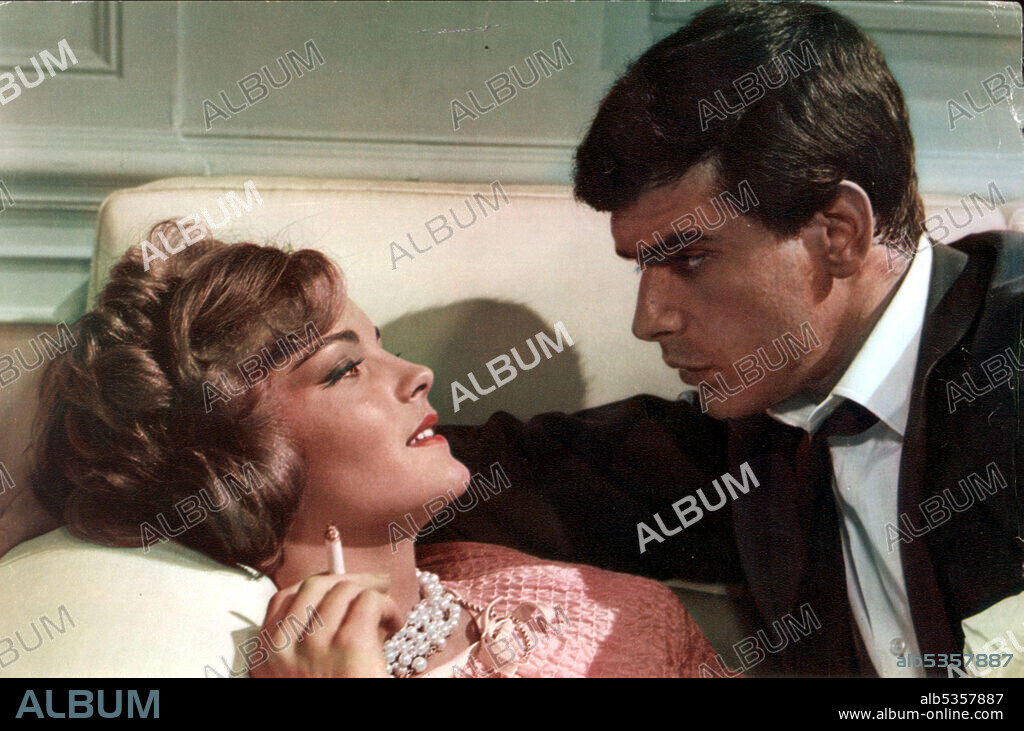 ROMY SCHNEIDER and TOMAS MILIAN in BOCCACCIO '70, 1962, directed by FEDERICO FELLINI, LUCHINO VISCONTI, MARIO MONICELLI and VITTORIO DE SICA. Copyright CINERIZ.