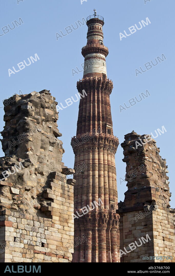 Qutub Minar minaret tower with verses from the Qur'an at Qutab Minar Complex, Unesco World Heritage Site in New Delhi, India.