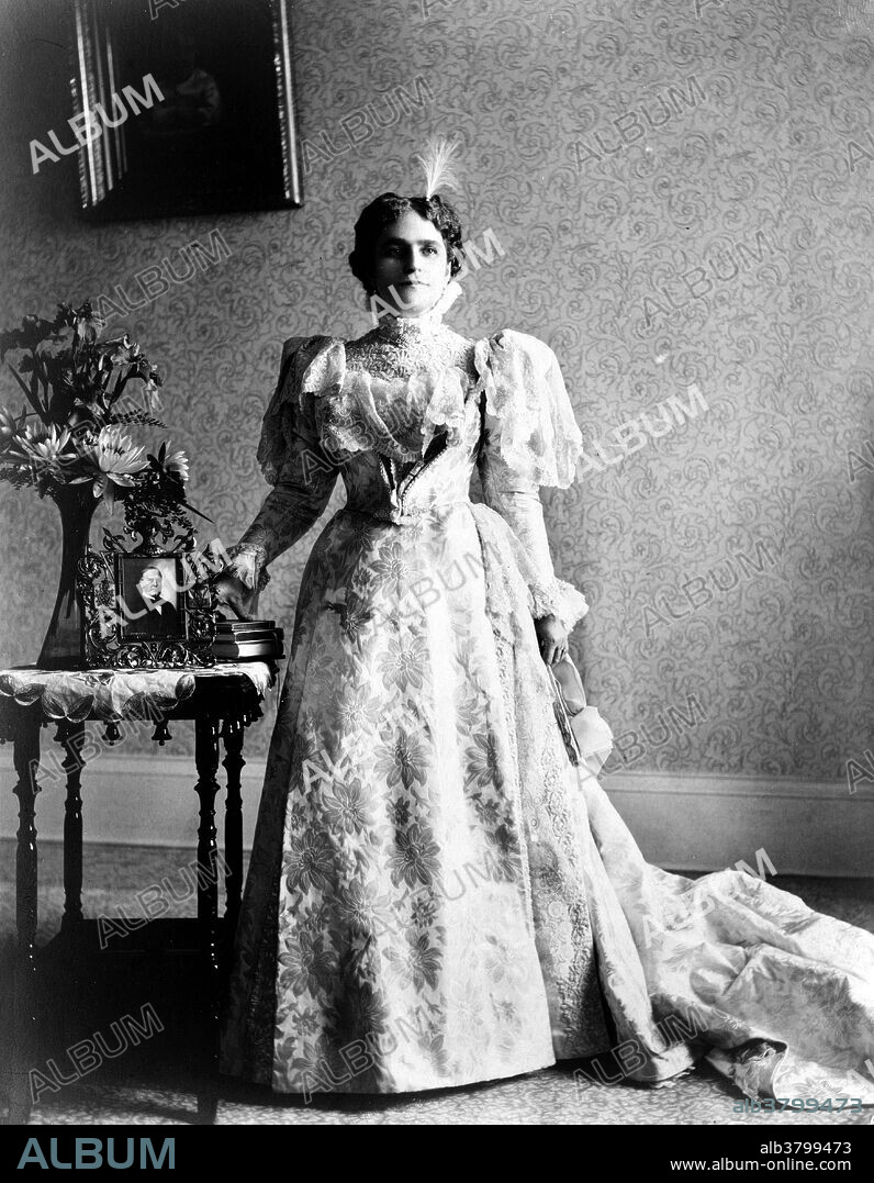 Ida Saxton McKinley (June 8, 1847 - May 26, 1907), wife of William McKinley, was First Lady of the United States from 1897 to 1901. Ida was refined, charming, and strikingly attractive. While single, she worked for a time as a cashier in her father's bank, a position then usually reserved for men. William McKinley, aged 27, married Ida Saxton, aged 23, on January 25, 1871. Possessed of a fragile, nervous temperament, Mrs. McKinley broke down under the loss of her mother and two young daughters within a short span of time. She developed epilepsy and became totally dependent on her husband. President McKinley took great care to accommodate her condition. In a break with tradition, he insisted that his wife be seated next to him at state dinners rather than at the other end of the table. Guests noted that whenever Mrs. McKinley was about to undergo a seizure, the President would gently place a napkin or handkerchief over her face to conceal her contorted features. When it passed, he would remove it and resume whatever he was doing as if nothing had happened. With the assassination of her husband by Leon Czolgosz in September 1901, Mrs. McKinley lost much of her will to live. Although she bore up well in days between the shooting and the president's death, she could not bring herself to attend his funeral. She survived her beloved husband by less than six years. She died in 1907 at the age of 59.