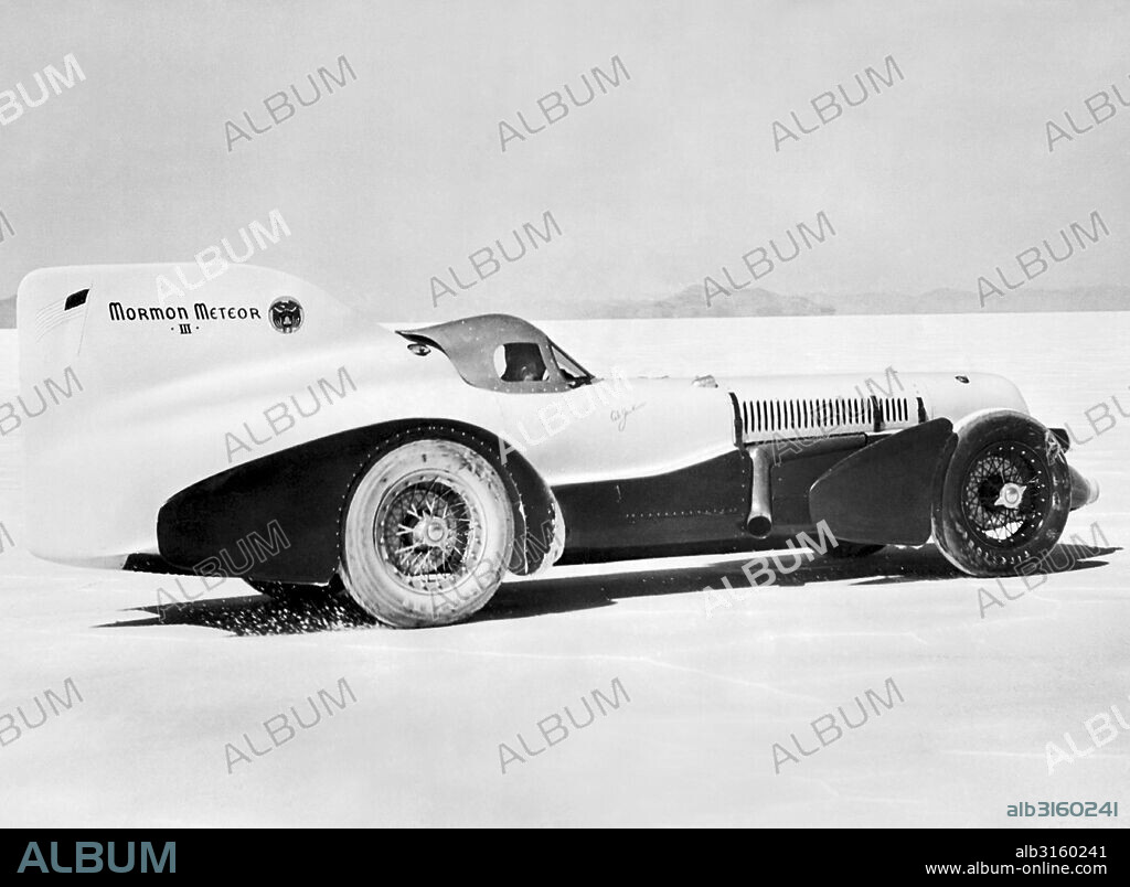 Bonneville Salt Flats, Utah: July 21, 1939 Race car driver Ab Jenkins as he starts our on a test run in his attempt to set a new land speed record in his Mormon Meteor III race car.