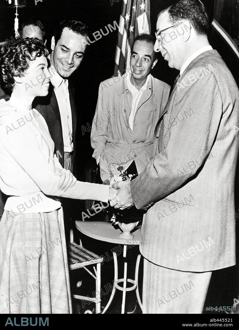 DORE SCHARY, GEORGES GUETARY, LESLIE CARON and VINCENTE MINNELLI in AN AMERICAN IN PARIS, 1951, directed by VINCENTE MINNELLI. Copyright M.G.M.