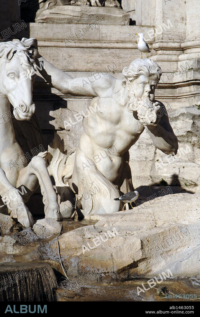 Italy. Rome. Trevi Fountain. Baroque. Designed by Nicola Salvi and completed by Pietro Bracci. 1762. Two tritons guide the carriage of Neptune, taming two Hippocampus. Detail of a Triton with a sea shell.