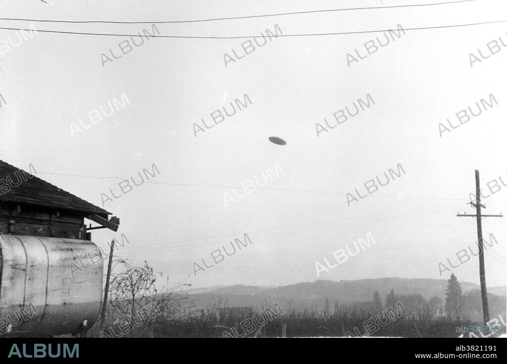 The McMinnville UFO photographs were taken on a farm near McMinnville, Oregon, in 1950. The photos were reprinted in Life magazine and in newspapers across the nation, and are often considered to be among the most famous ever taken of a UFO. The photos remain controversial, with many UFO researchers claiming they show a genuine, unidentified object in the sky, while many UFO sceptics claim that the photos are a hoax. At 7:30 pm on May 11, 1950, Evelyn Trent spotted a slow-moving, metallic disk-shaped object heading in her direction. She yelled for her husband, Paul, who came out and also saw the object. He went back inside the house to get a camera and took two photos before it sped away.