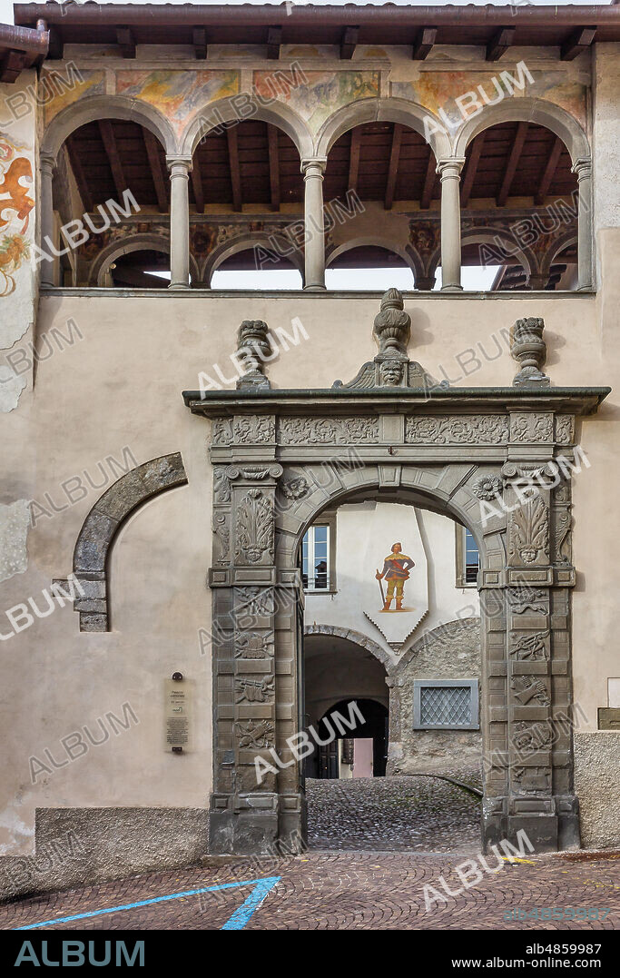 Clusone, Palazzo Comunale (Town Hall), built in the XI and XII century), Eastern Façade: stone portal and a small loggia with frescoes (XVI century).