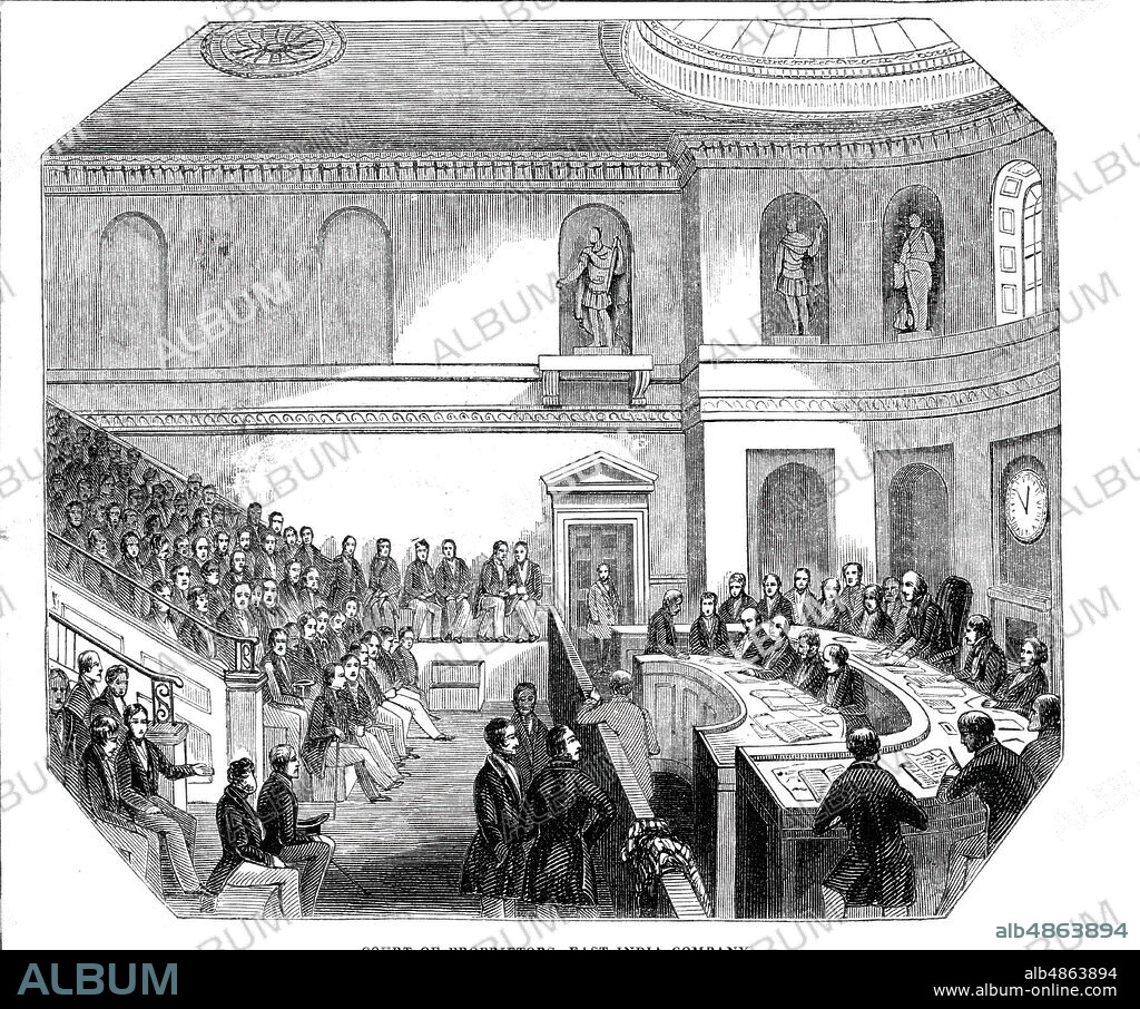 Court of Proprietors, East India Company, 1844. '...a view of the General Court Room [in Leadenhall Street, London]. Its east side is occupied by rows of seats, which rise from the floor, near the middle of the room, towards the ceiling, backed by a gallery, where the public are admitted; on the floor are the seats for the chairman, secretary, and clerks. Against the west wall, in niches, are six statues of persons who have distinguished themselves in the Company's service: Lord Clive, Warren Hastings, and the Marquis Cornwallis occupy those on the left; and Sir Eyre Coote, General Lawrance, and Sir George Pococke those on the right. It is understood that the statue of the Marquis Wellesley will be placed in the vacant space in the middle'. From "Illustrated London News", 1844, Vol I.