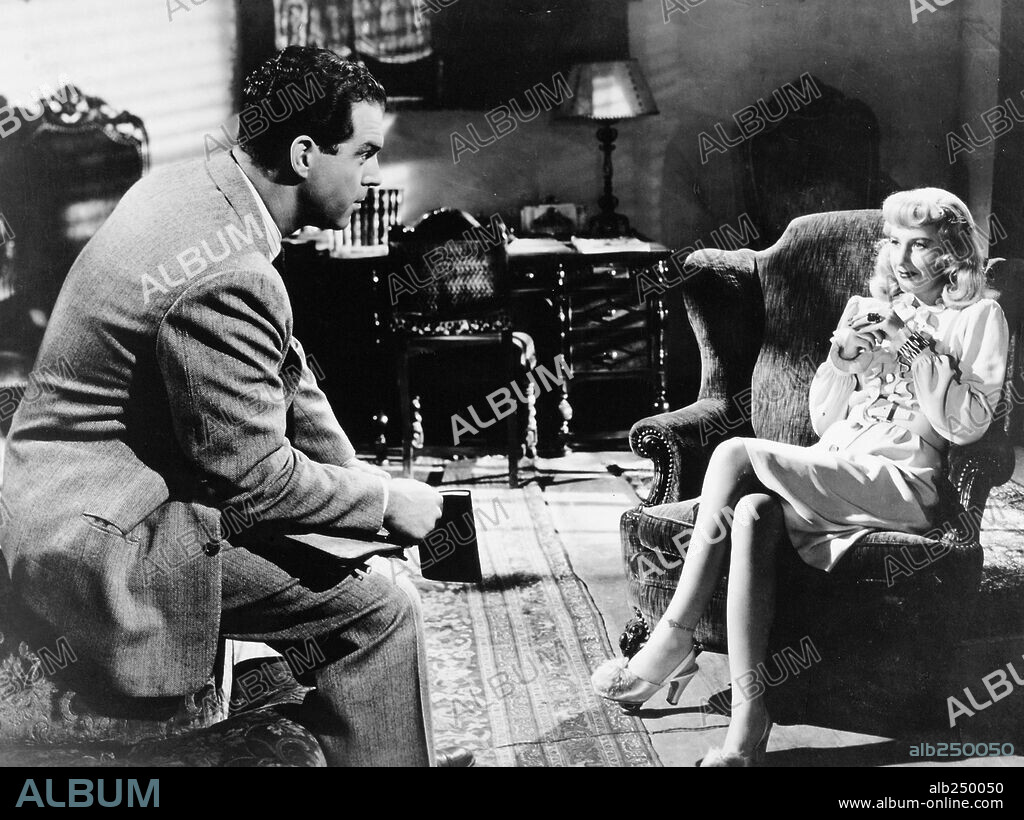BARBARA STANWYCK and FRED MACMURRAY in DOUBLE INDEMNITY, 1944, directed by BILLY WILDER. Copyright PARAMOUNT PICTURES.
