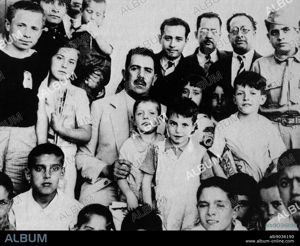Spanish refugee children are received by President Cardenas of Mexico, during the Spanish Civil War. Lázaro Cárdenas (1895 1970) was a general in the Mexican Revolution and President of Mexico between 1934 and 1940.