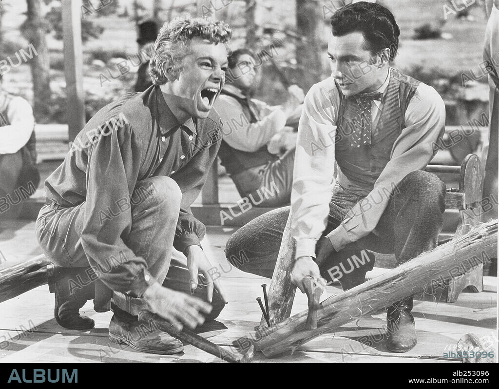 RUSS TAMBLYN en SIETE NOVIAS PARA SIETE HERMANOS, 1954 (SEVEN BRIDES FOR SEVEN BROTHERS), dirigida por STANLEY DONEN. Copyright M.G.M.