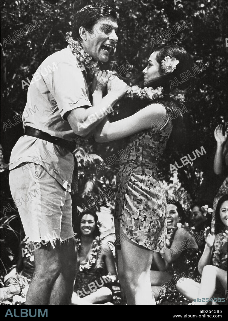 DICK VAN DYKE and NANCY KWAN in LIEUTENANT ROBIN CRUSOE U. S. N., 1966, directed by PAUL BYRON. Copyright WALT DISNEY PRODUCTIONS.