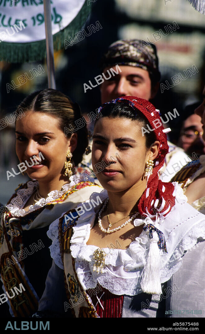 "Falleras" (young wome n wirth traditional dressing) during the "Fallas" festivity.