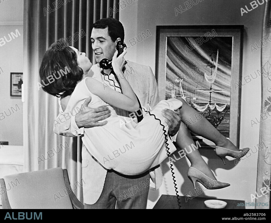LESLIE CARON and ROCK HUDSON in A VERY SPECIAL FAVOR, 1965, directed by MICHAEL GORDON. Copyright UNIVERSAL PICTURES.