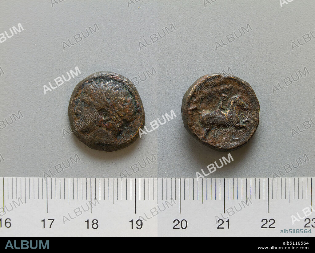 Ruler: Philip II, King of Macedonia, Greek, 382336 B.C., ruled 359336 B.C.Coin of Philip II, King of Macedonia, 359336 B.C., Bronze, 6.46 g, 4:00, 17.2 mm, Made in Greece, Greek, Numismatics.