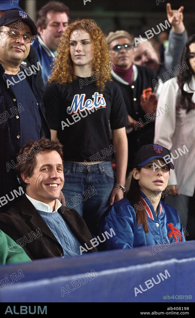 HUGH GRANT and SANDRA BULLOCK in TWO WEEKS NOTICE, 2002, directed by MARC LAWRENCE. Copyright WARNER BROS. PICTURES.
