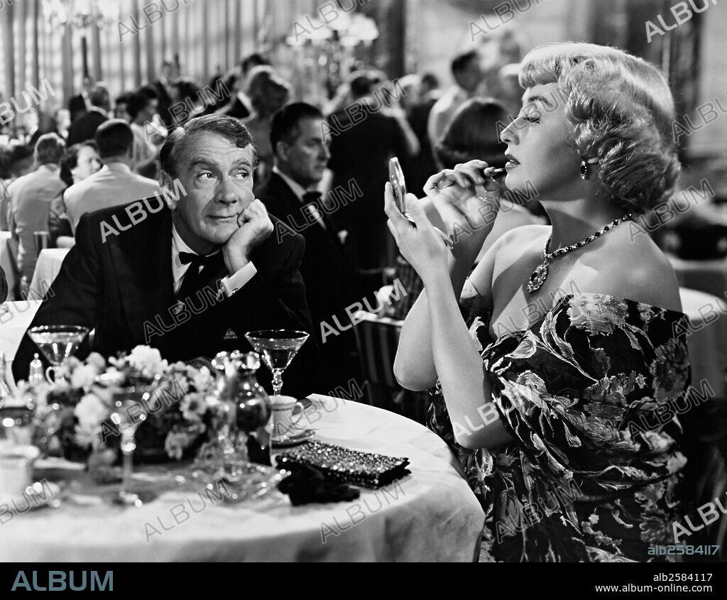 CLIFTON WEBB and JOAN BLONDELL in FOR HEAVEN'S SAKE, 1950, directed by GEORGE SEATON. Copyright 20TH CENTURY FOX.