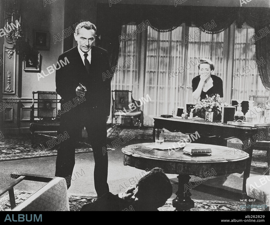 BETTE DAVIS and PAUL LUKAS in WATCH ON THE RHINE, 1943, directed by HERMAN SHUMLIN. Copyright WARNER BROTHERS.