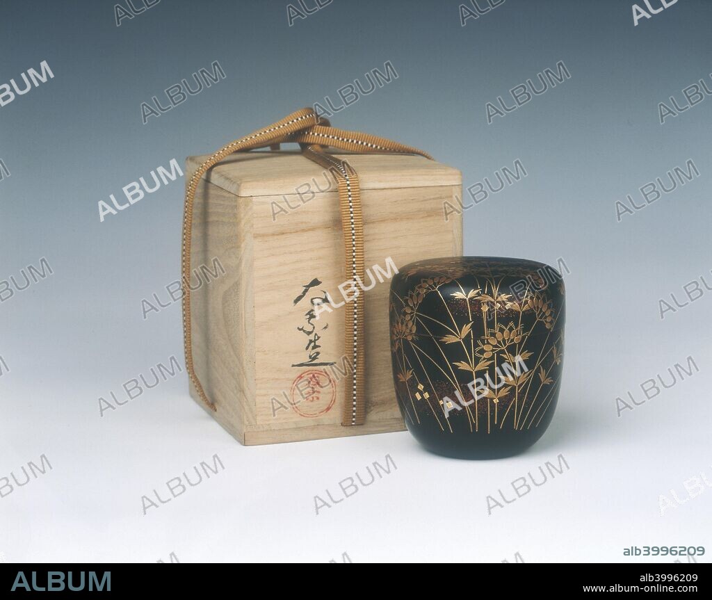 Lacquer natsume with stork, Middle Edo period, Japan, 18th century. A natsume (tea jar and cover) in gold maki-e on black lacquer. The lid is decorated with a single stork standing in a pond with marsh leaves overlapping towards the base. The interior has gold sprinkled on a copper background (nashiji). The eye of the stork has inlay of mother of pearl.