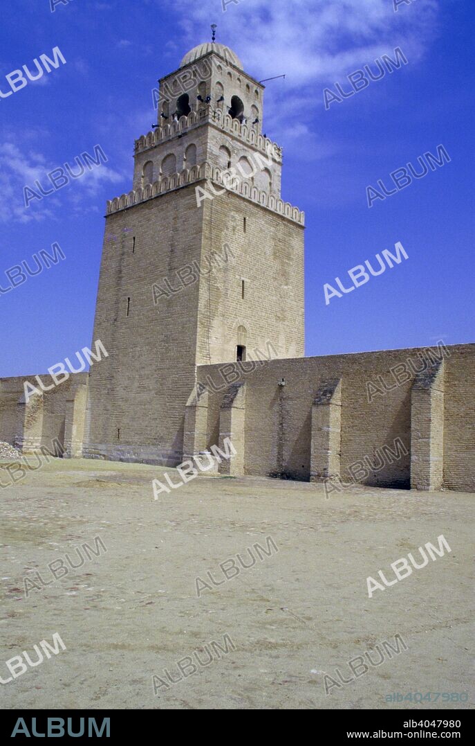 Minaret of the Great Mosque, Kairouan, Tunisia. The Great Mosque of Uqba in Kairouan was originally founded in 670 by the Arab general Uqba ibn Nafi. The building as it appears today dates from the time of the Aghlabids in the 9th century.