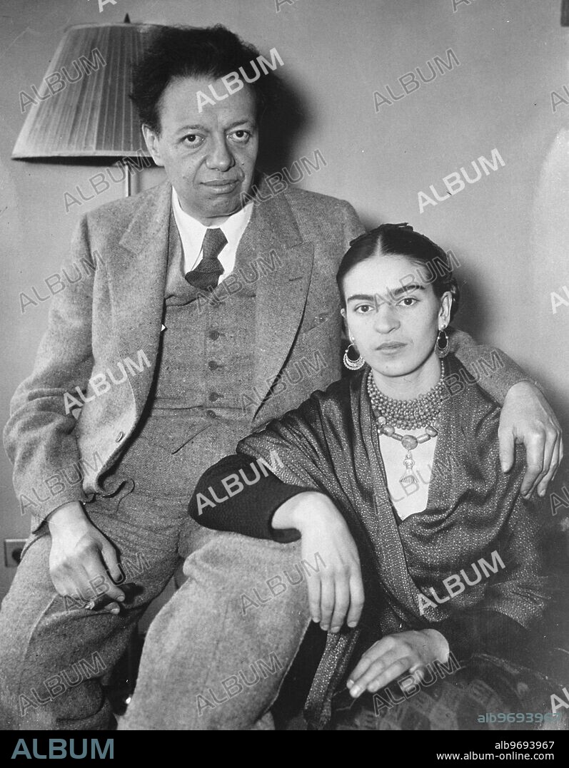 Mexican mural artist dismissed from work at Rockefeller building in New York after painting communist fresco .. A mural showing Lenin joining the hands of a soldier and a white coloured worker painted by Seor Diego Rivera , the Mexican artist , has led to his dismissal from further work at the great Rockfeller Centre in New York . Members of Mr John D Rockefeller ' s family took exception to the painting and an ultimatum was delivered to Senor Rivera , which insisted that he must change the fresco or cease work . So far the artist , who is said to have pronounced Communist leanings , has refused to alter his work and Mr Nelson Rockfeller , grandson of the oil magnate , has ordered the fresco to be covered . Following the incident work which Senor Rivera was executing for a motor company in connection with the Chicago World Fair has been cancelled .. Photo shows ; Senor Diego Rivera and his wife at their New York home after the artist ' s dismissal .. 17 May 1933.