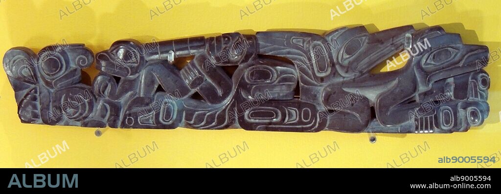 Panel pipe decorated with European figures, a large beaver, raven and frogs. Haida people, Queen Charlotte Island, British Columbia, Canada, 19th century.