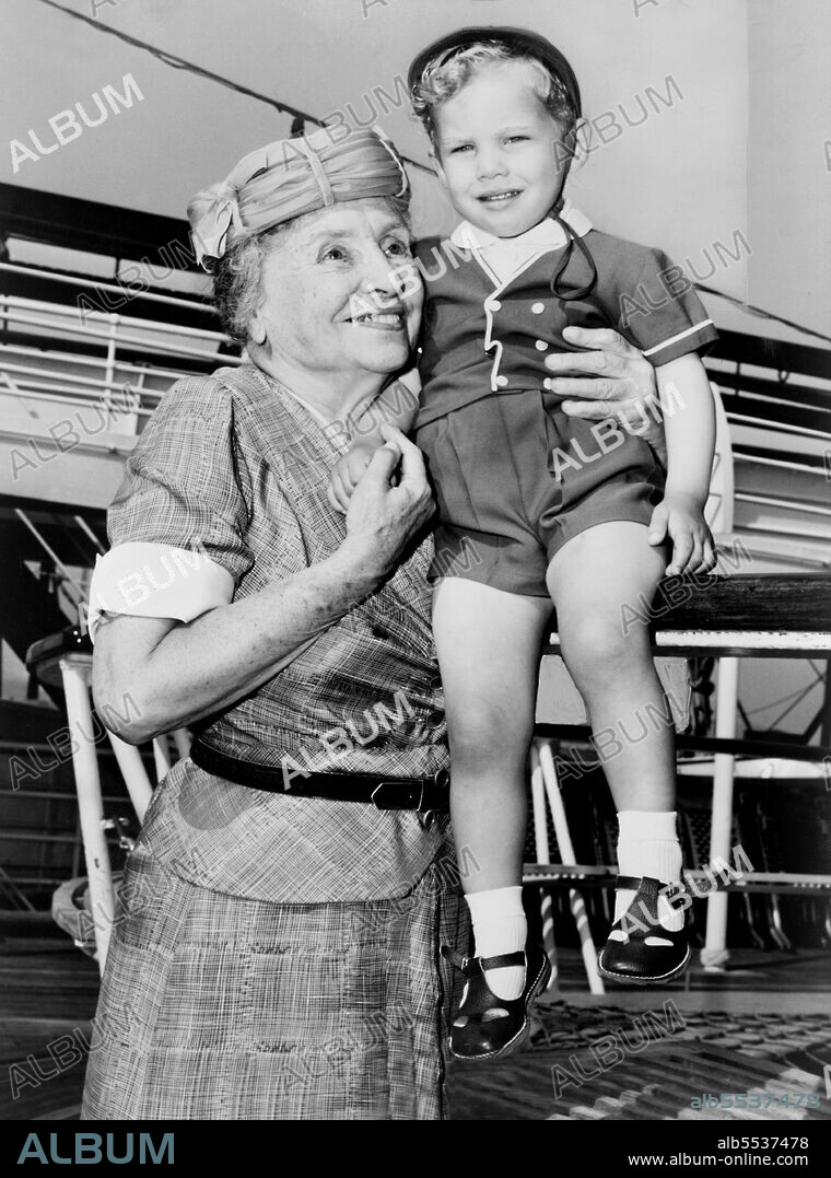 Helen Keller with two-year-old Donald Hart on board Ocean Liner Independence after ship docked in New York City, New York, USA, Ed Ford, New York World-Telegram and the Sun Newspaper Photograph Collection, 1956.