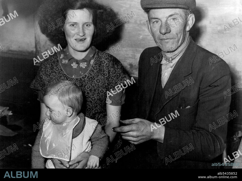 Irish Sheep Farmer Inherits Wolfram Mines -- Sheep-farmer who has inherited. two valuable wolfram mines is 55-year-old Mr. Joseph Higgins, of Valleymount, Blessington, County Wicklow, pictured here with his wife, Mary Margaret, and their 8-months-old son Maurice. Mr. Higgins may soon be going to Australia to see the mines, which became his property when their owner, his brother John James, died last November. John James, who went to Australia 37 years ago, went into the mining business on his ow.