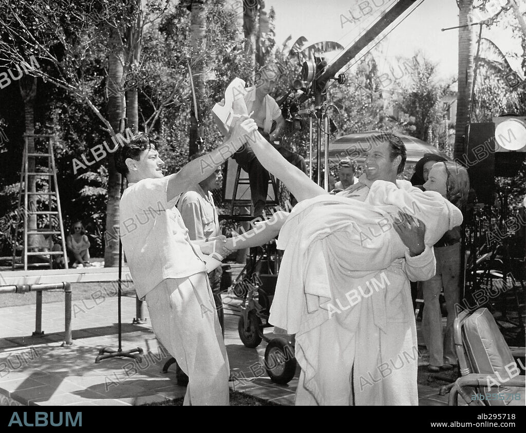 JOEL MCCREA, PRESTON STURGES y VERONICA LAKE en LOS VIAJES DE SULLIVAN, 1941 (SULLIVAN'S TRAVELS), dirigida por PRESTON STURGES. Copyright PARAMOUNT PICTURES.