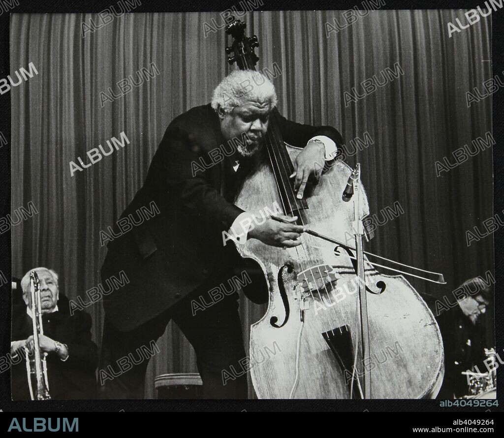 Big Chief Russell Moore (trombone), Arvell Shaw (double bass) and Barrett Deems (drums) performing, Stevenage, Hertfordshire, 1984. All three musicians worked with Louis Armstrong during their careers.