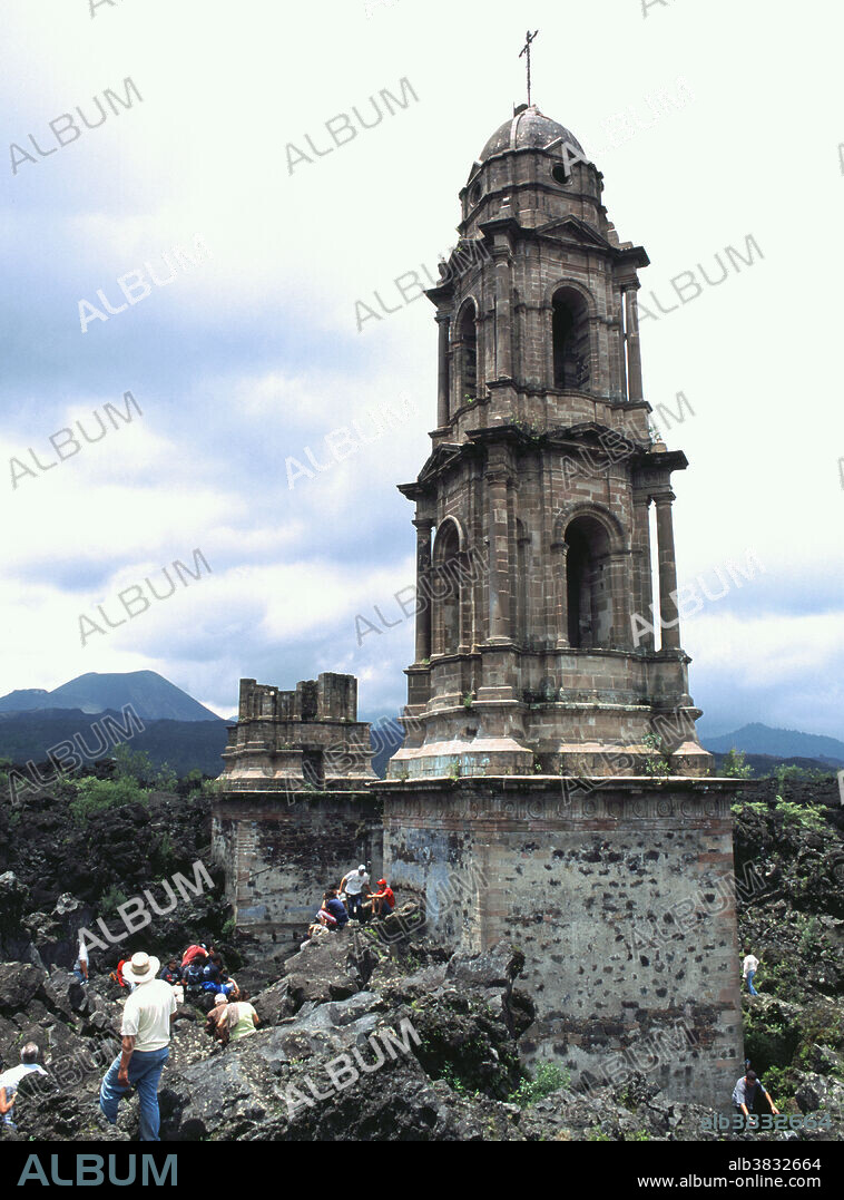 Church buried in lava from Paricutin volcano. Paricutin is a volcano in the Mexican state of Michoacan, close to a lava-covered village of the same name. Paricutin is the youngest of more than 1,400 volcanic vents that exist in the Trans-Mexican Volcanic Belt. It started as fissure in a cornfield in 1942 and grew to 424 meters in height by 1952, when it became dormant. It is often named as one of the Seven Natural Wonders of the World.