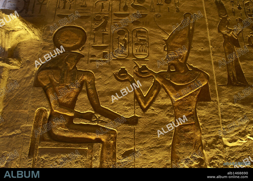 Egyptian art. Great Temple of Ramses II. 19th Dynasty. Relief depicting the pharaoh Ramses II making an offering to god Ra. 19th Dynasty. New Kingdom. Abu Simbel. Egypt.