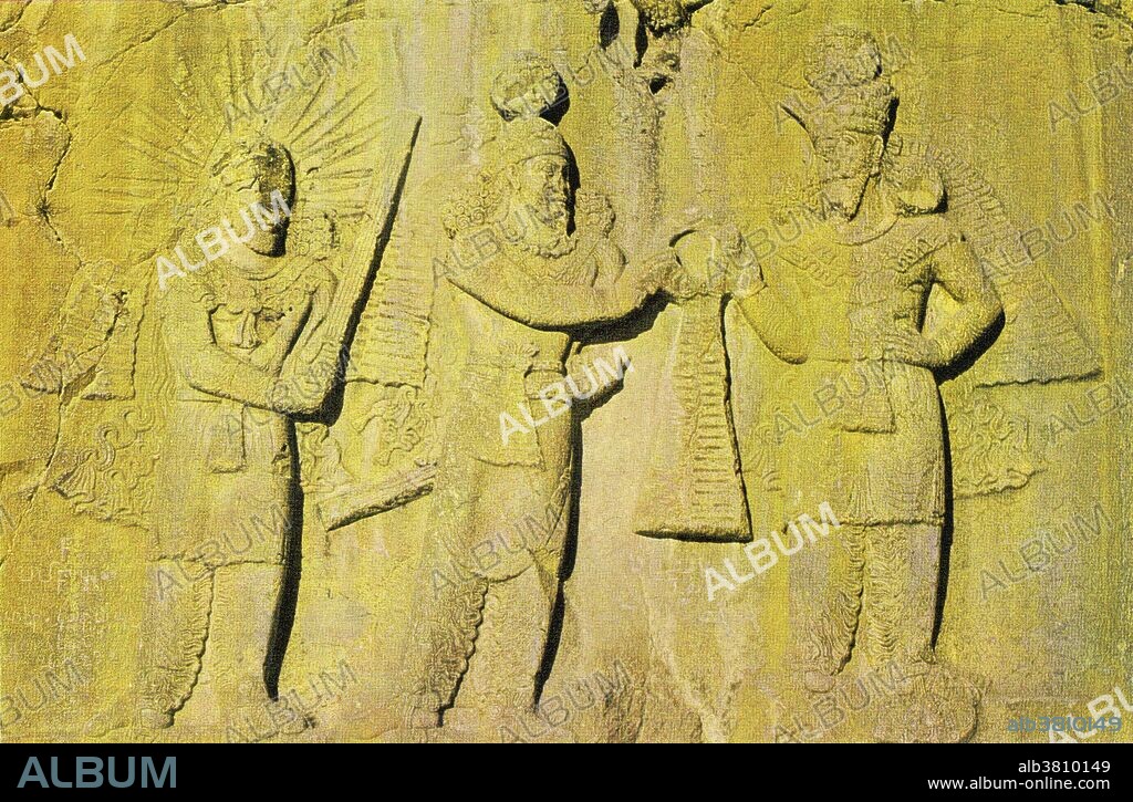 Ohrmazd, King Ardeshir II and Mithras. Ohrmazd (or Ahura Mazda) and Mithras flank the Persian king Ardeshir II. Orhrmazd is the central god of the Zoroastrian religion. He is considered the inventor and upholder of truth. Mithras is a deity of contract and a mediator between gods and men.