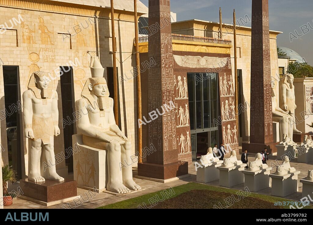 Dubai. United Arab Emirates. Entrance to the Pyramids restaurant complex with statues, obelisk and pyramid at the Wafi Centre/Center.