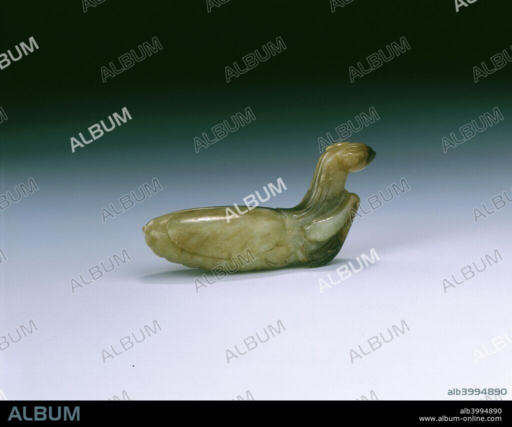 Jade praying mantis, Southern Song dynasty, China, 1127-1279. A praying mantis in jade with a slightly greenish tinge and brown suffusions. Its head is raised, its feelers and legs are at rest and its eyes and beak are prominent. The praying mantis was a symbol of bravery.